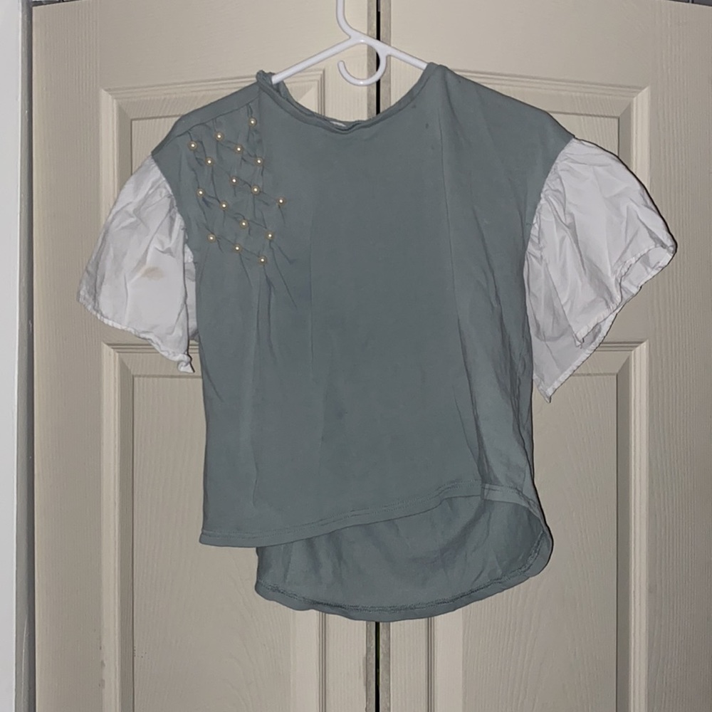 Designer British blue-green shirt with ruffle sleeves